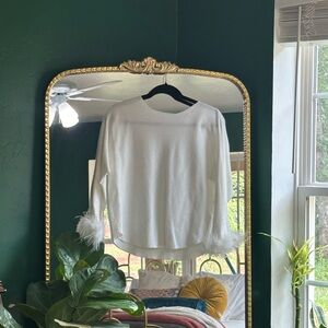 Bloomingdale’s Sioni Milano White Feathered Sweater.